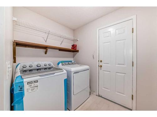 37 Somerside Crescent Sw, Calgary, AB - Indoor Photo Showing Laundry Room