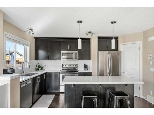 146 Cranford Way Se, Calgary, AB - Indoor Photo Showing Kitchen With Upgraded Kitchen