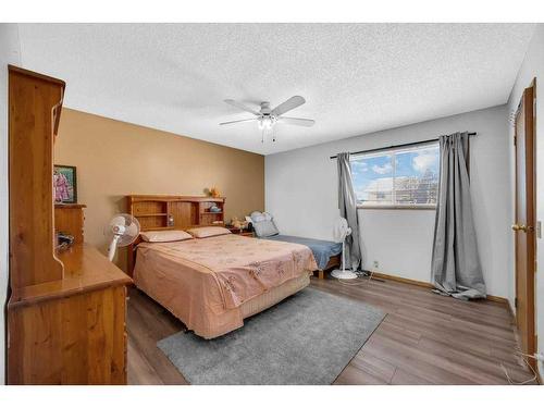 377 Martinwood Place Ne, Calgary, AB - Indoor Photo Showing Bedroom