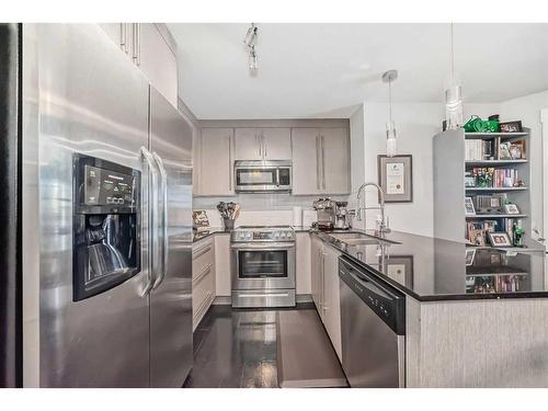 1204-11 Mahogany Row Se, Calgary, AB - Indoor Photo Showing Kitchen With Stainless Steel Kitchen With Upgraded Kitchen