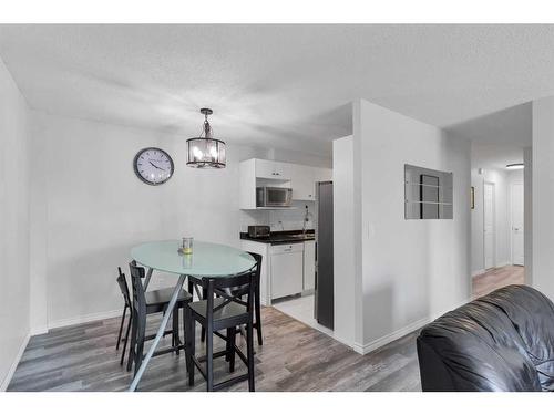 11A-80 Galbraith Drive Sw, Calgary, AB - Indoor Photo Showing Dining Room