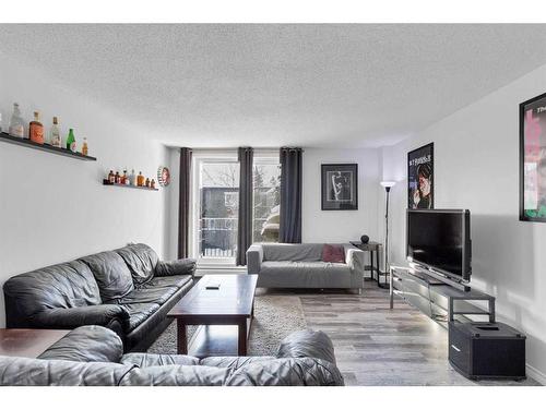 11A-80 Galbraith Drive Sw, Calgary, AB - Indoor Photo Showing Living Room