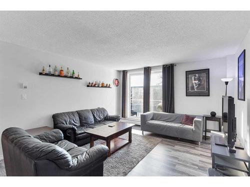 11A-80 Galbraith Drive Sw, Calgary, AB - Indoor Photo Showing Living Room