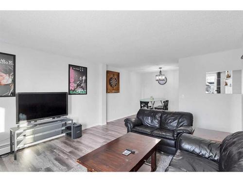 11A-80 Galbraith Drive Sw, Calgary, AB - Indoor Photo Showing Living Room