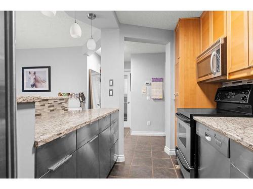 103-1111 13 Avenue Sw, Calgary, AB - Indoor Photo Showing Kitchen