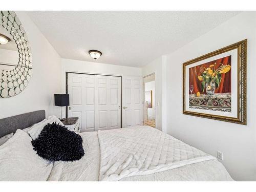 147 Sienna Park Green Sw, Calgary, AB - Indoor Photo Showing Bedroom