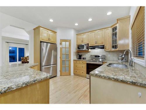 206 Discovery Ridge Way Sw, Calgary, AB - Indoor Photo Showing Kitchen With Double Sink With Upgraded Kitchen