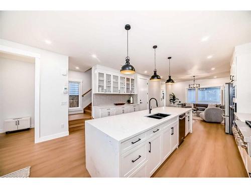 390 Hendon Drive Nw, Calgary, AB - Indoor Photo Showing Kitchen With Double Sink With Upgraded Kitchen