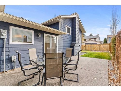 148 Woodbend Way, Okotoks, AB - Outdoor