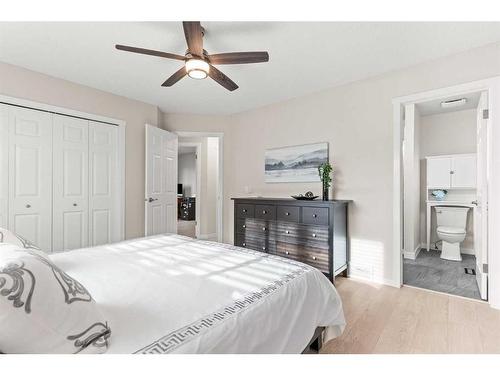 148 Woodbend Way, Okotoks, AB - Indoor Photo Showing Bedroom