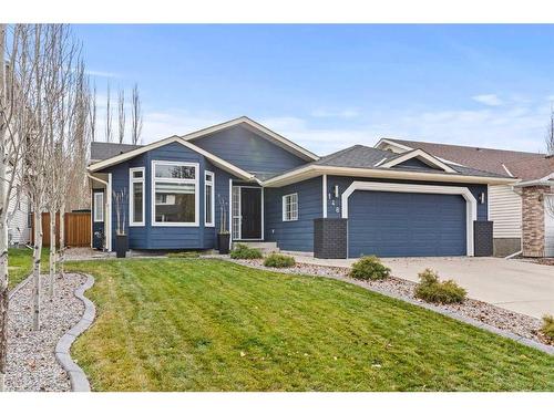 148 Woodbend Way, Okotoks, AB - Outdoor With Facade