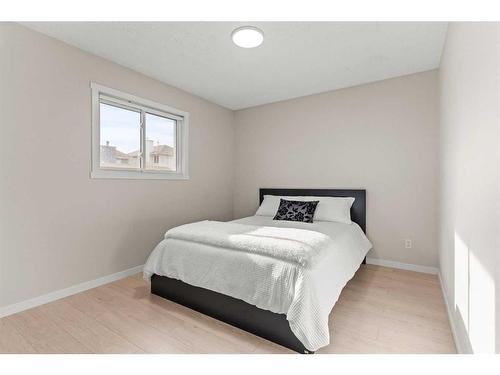 148 Woodbend Way, Okotoks, AB - Indoor Photo Showing Bedroom