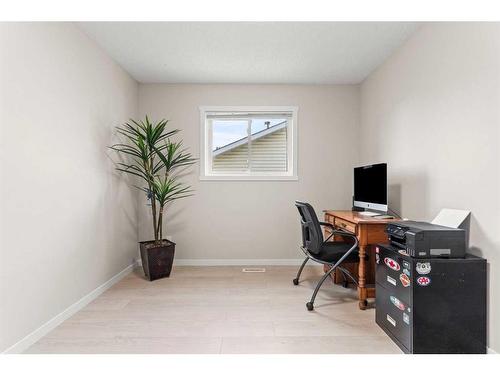 148 Woodbend Way, Okotoks, AB - Indoor Photo Showing Office