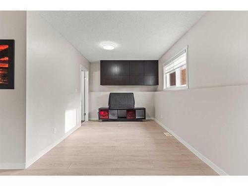 148 Woodbend Way, Okotoks, AB - Indoor Photo Showing Other Room