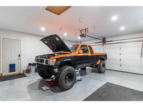 148 Woodbend Way, Okotoks, AB - Indoor Photo Showing Garage