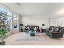 148 Woodbend Way, Okotoks, AB  - Indoor Photo Showing Living Room 