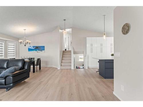 148 Woodbend Way, Okotoks, AB - Indoor Photo Showing Living Room