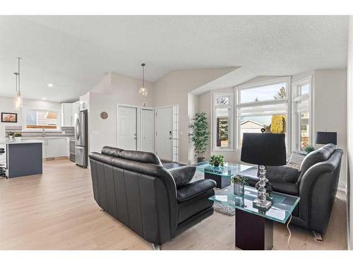 148 Woodbend Way, Okotoks, AB - Indoor Photo Showing Living Room