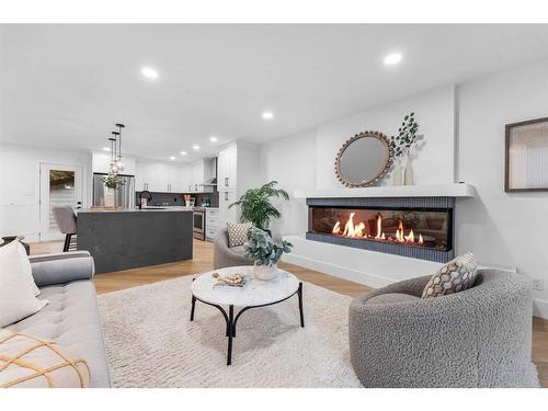 10404 Maplemont Road Se, Calgary, AB - Indoor Photo Showing Living Room With Fireplace