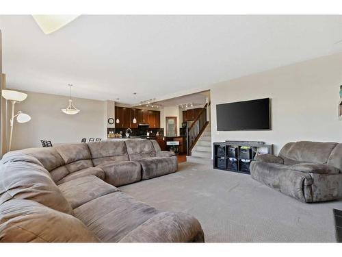 83 Copperstone Boulevard Se, Calgary, AB - Indoor Photo Showing Living Room