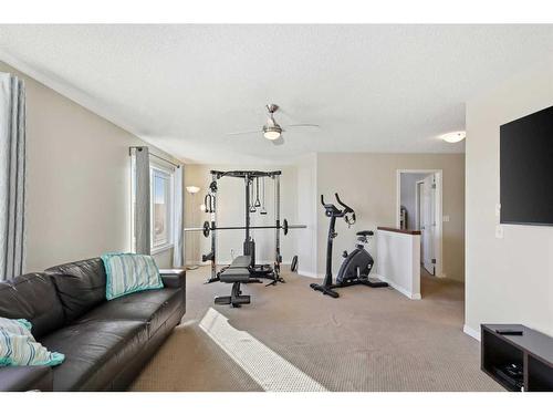 83 Copperstone Boulevard Se, Calgary, AB - Indoor Photo Showing Gym Room