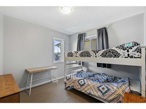 83 Copperstone Boulevard Se, Calgary, AB - Indoor Photo Showing Bedroom