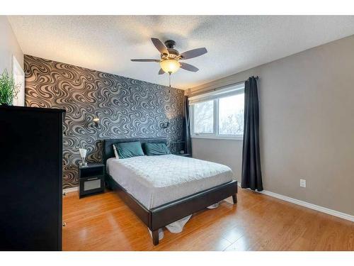 8203 Ranchview Drive Nw, Calgary, AB - Indoor Photo Showing Bedroom