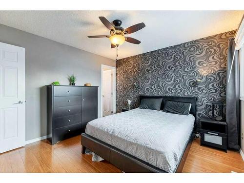 8203 Ranchview Drive Nw, Calgary, AB - Indoor Photo Showing Bedroom