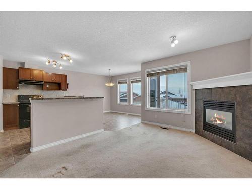 19 Royal Crest Court Nw, Calgary, AB - Indoor With Fireplace