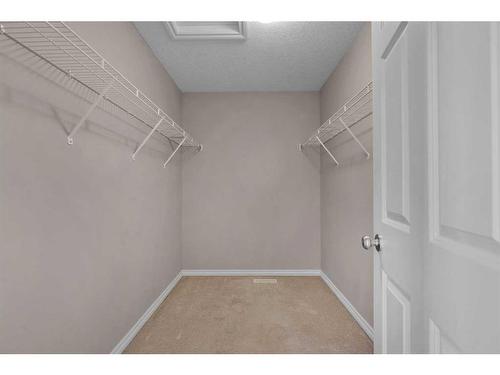 19 Royal Crest Court Nw, Calgary, AB - Indoor With Storage