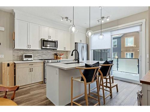 211 Livingston Common Ne, Calgary, AB - Indoor Photo Showing Kitchen With Stainless Steel Kitchen With Upgraded Kitchen