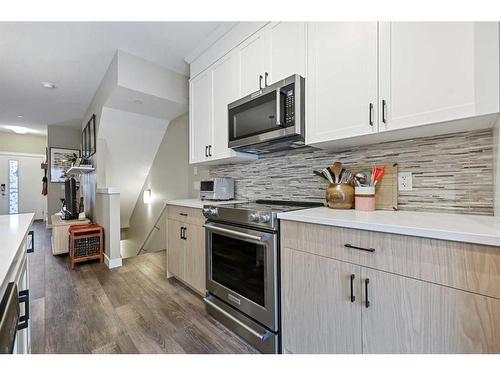 211 Livingston Common Ne, Calgary, AB - Indoor Photo Showing Kitchen With Upgraded Kitchen