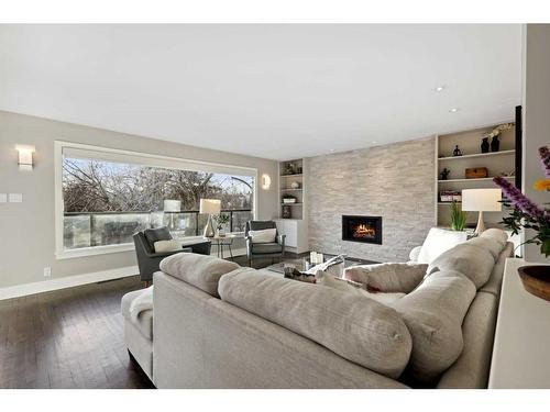 2407 Juniper Road Nw, Calgary, AB - Indoor Photo Showing Living Room With Fireplace