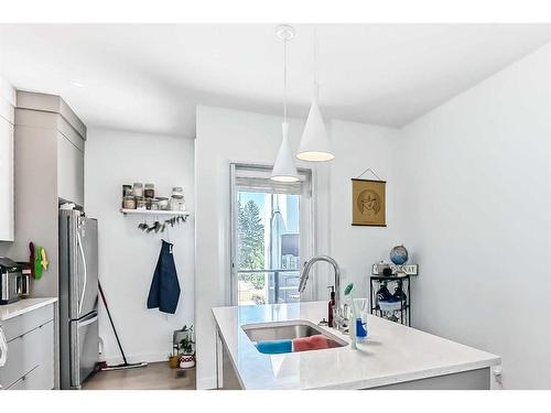 3543 69 Street Nw, Calgary, AB - Indoor Photo Showing Kitchen With Double Sink