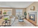 110 Autumn Circle Se, Calgary, AB  - Indoor Photo Showing Living Room With Fireplace 