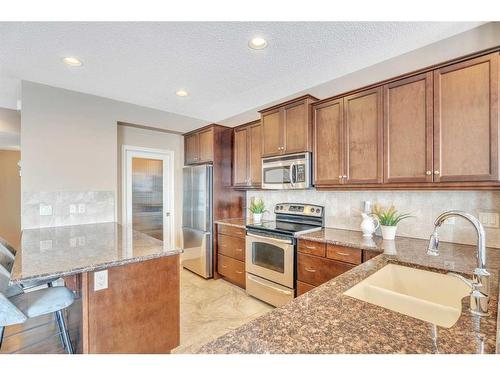 110 Autumn Circle Se, Calgary, AB - Indoor Photo Showing Kitchen With Double Sink