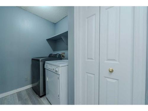 84 Douglas Glen Crescent Se, Calgary, AB - Indoor Photo Showing Laundry Room