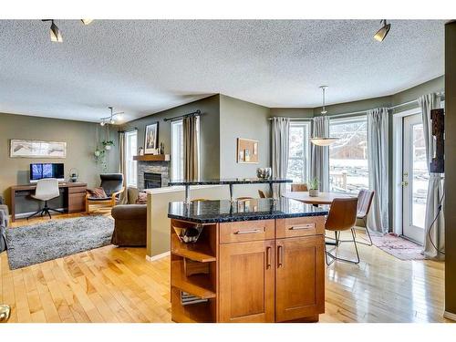 32 Hidden Creek Park Nw, Calgary, AB - Indoor With Fireplace