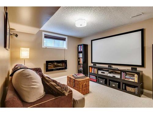 32 Hidden Creek Park Nw, Calgary, AB - Indoor With Fireplace