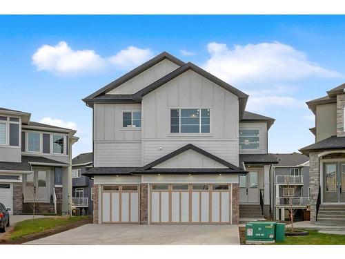 327 Kinniburgh Place, Chestermere, AB - Outdoor With Facade