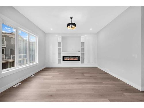 327 Kinniburgh Place, Chestermere, AB - Indoor With Fireplace