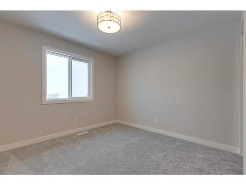 46 Fireside Point, Cochrane, AB - Indoor Photo Showing Other Room