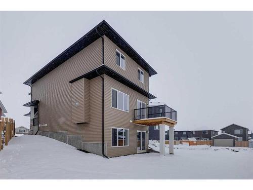 46 Fireside Point, Cochrane, AB - Outdoor With Exterior