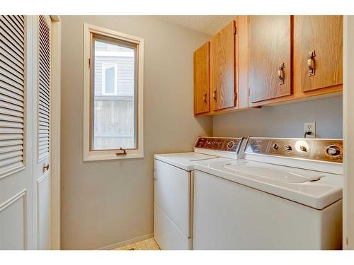 7 Stradwick Place Sw, Calgary, AB - Indoor Photo Showing Laundry Room