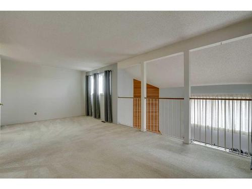 7 Stradwick Place Sw, Calgary, AB - Indoor Photo Showing Other Room