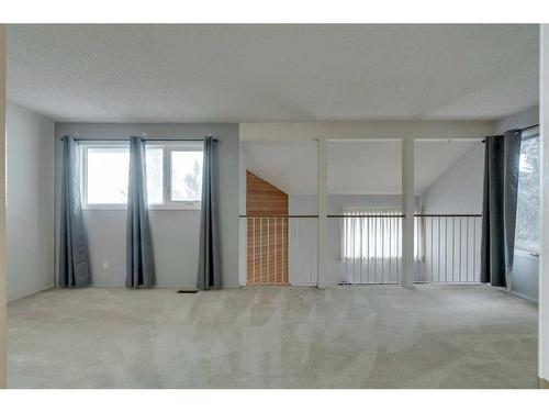 7 Stradwick Place Sw, Calgary, AB - Indoor Photo Showing Other Room