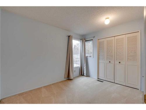 7 Stradwick Place Sw, Calgary, AB - Indoor Photo Showing Other Room