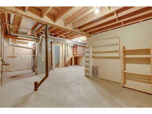 7 Stradwick Place Sw, Calgary, AB - Indoor Photo Showing Basement