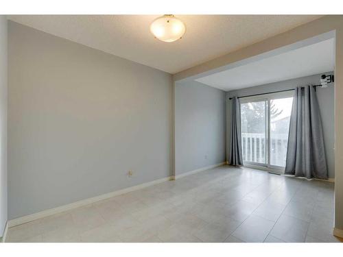 7 Stradwick Place Sw, Calgary, AB - Indoor Photo Showing Other Room