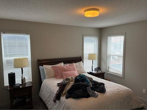 91 Evanscrest Way Nw, Calgary, AB - Indoor Photo Showing Bedroom